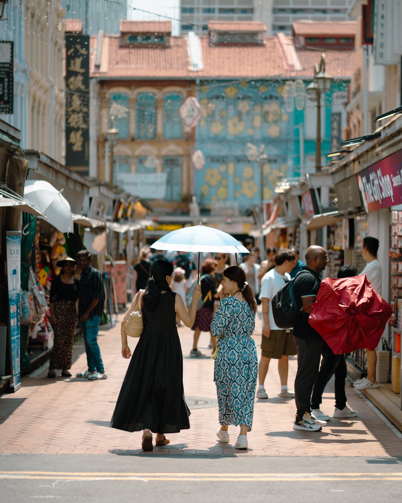 People walking around Chinatown in Singapore