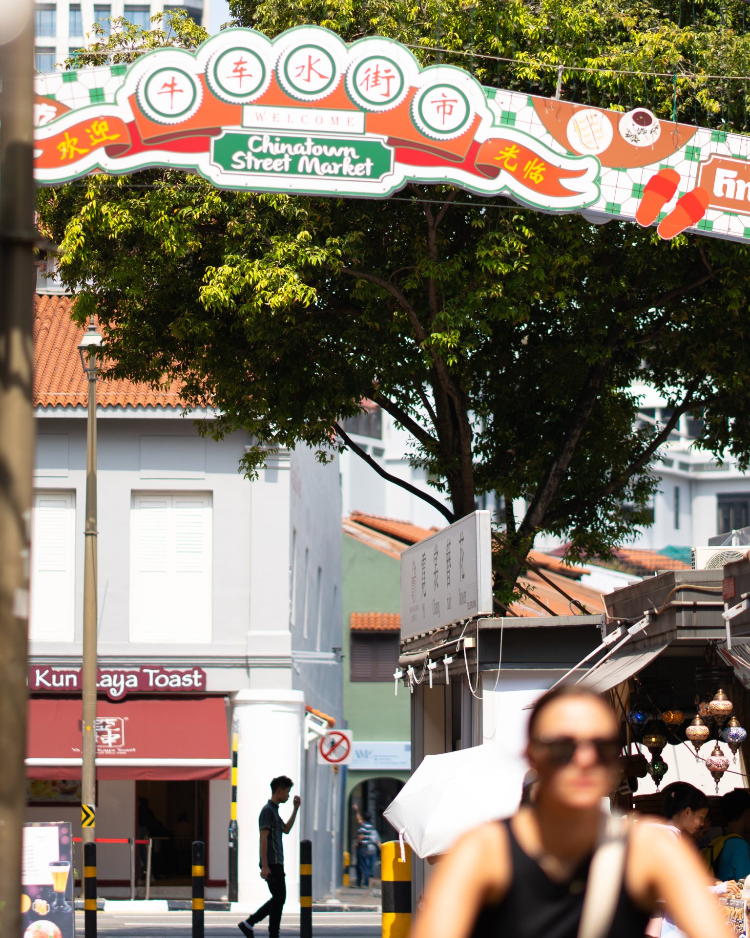 People walking around Chinatown in Singapore